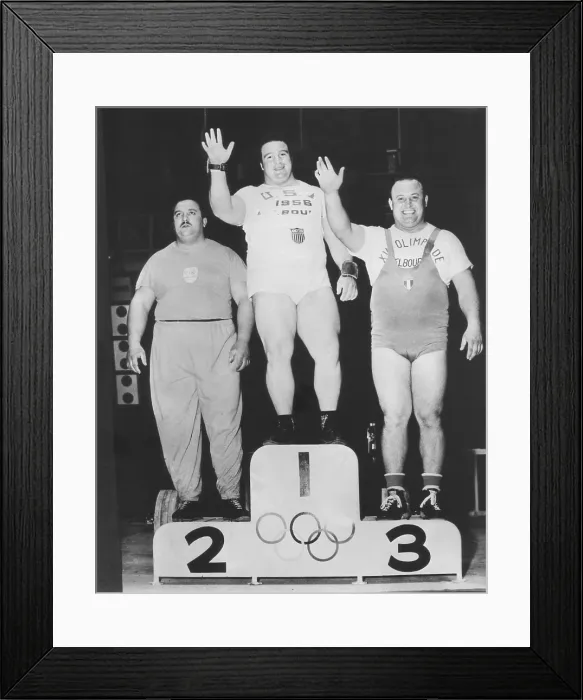 Framed Print : Paul Anderson (center) won a Olympic Gold Medal in heavyweight weightlifting. Melbourne, Australia Games, Nov. 26, 1956 Framed Print : Paul Anderson (center) won a Olympic Gold Medal in heavyweight weightlifting. Melbourne, Australia Games, Nov. 26, 1956