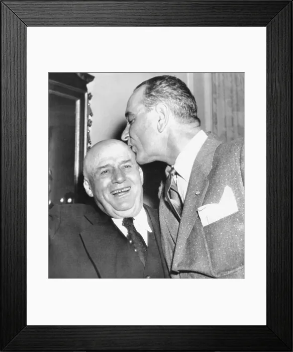 Framed Print : Speaker Sam Rayburn gets a kiss on the head from Senate Majority Leader Lyndon Johnson. Jan. 6, 1956