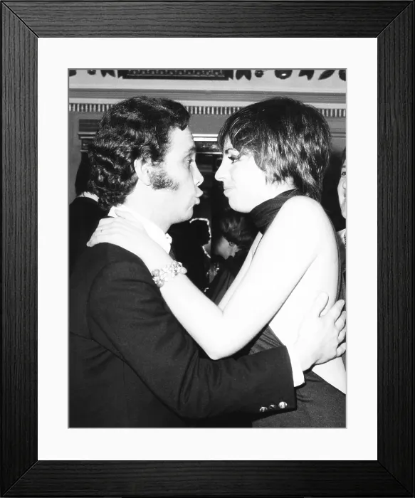 Framed Print : Joel Grey greets Liza Minnelli at her opening at the Waldorf Astoria's Empire Room. Jan. 2, 1970
