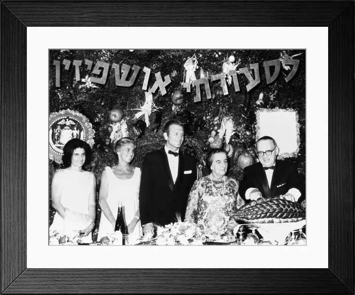 Framed Print : Israeli Premier Golda Meir honored in New York City, Oct. 1, 1969. Rabbi Emmanuel Rackman cuts Challah for Festival of Succoth at Brooklyn Museum. L-R: Mrs