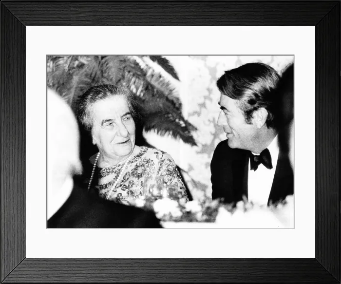 Framed Print : Golda Meir, Prime Minister of Israel dines with Actor Gregory Peck, Oct. 2, 1969. The motion picture and television industries sponsored the dinner in her honor