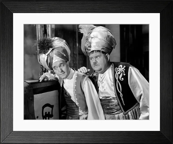 Framed Print : A-HAUNTING WE WILL GO, from left: Stan Laurel, Oliver Hardy, 1942. TM & copyright 20th Century Fox Films Corp. All rights reserved / courtesy Everett Collection