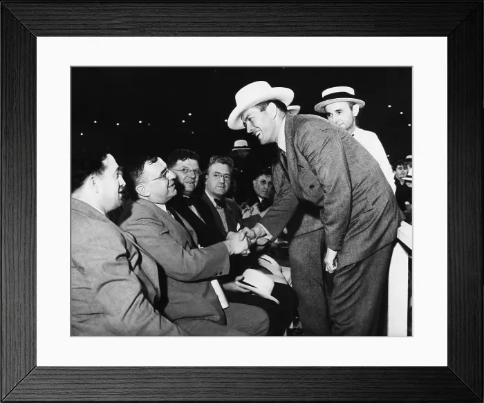 Framed Print : Two prominent citizens were at the ringside in the Cleveland Stadium. Gene Tunney, the retired undefeated heavyweight champion and Mayor Anton J. Cermak of Chicago shake hands
