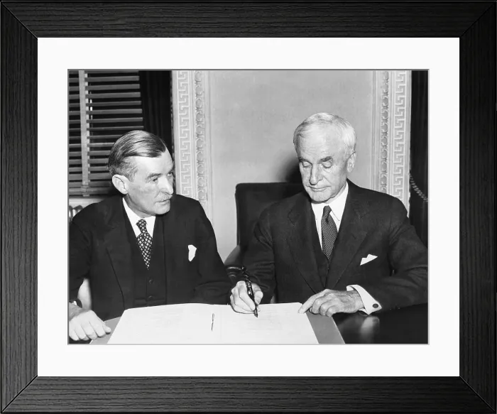 Framed Print : Sec. of State Cordell Hull signs a trade pact between the United States and Czechoslovakia. March 7, 1938