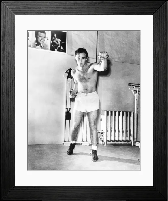 Framed Print : A STREETCAR NAMED DESIRE, Marlon Brando, working out during production, ca. late 1950 Framed Print : A STREETCAR NAMED DESIRE, Marlon Brando, working out during production, ca. late 1950