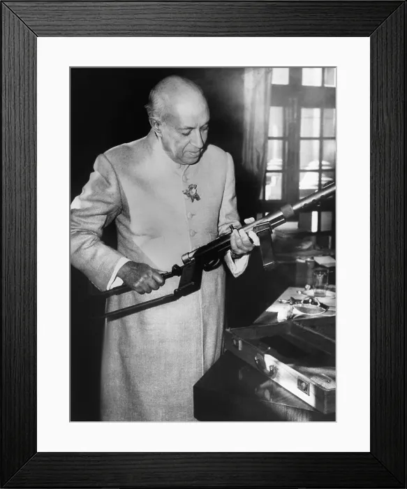 Framed Print : Jawaharlal Nehru, Prime Minister of India, holding a machine gun, Dec. 3, 1962 Framed Print : Jawaharlal Nehru, Prime Minister of India, holding a machine gun, Dec. 3, 1962