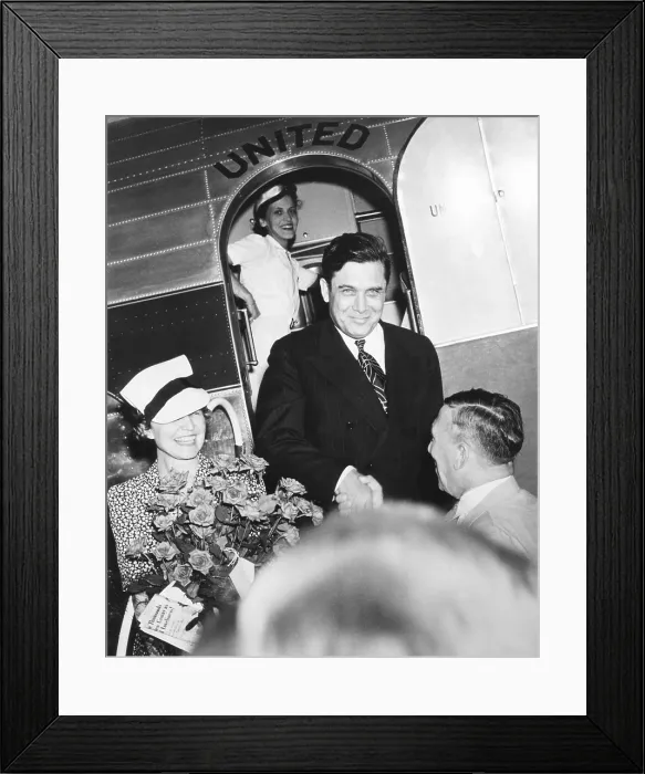 Framed Print : Wendell and Edith Willkie are greeted as the exit they United Airlines DC-3 campaign plane. July-Sept. 1940. (CSU_2015_11_1402) Framed Print : Wendell and Edith Willkie are greeted as the exit they United Airlines DC-3 campaign plane. July-Sept. 1940. (CSU_2015_11_1402)