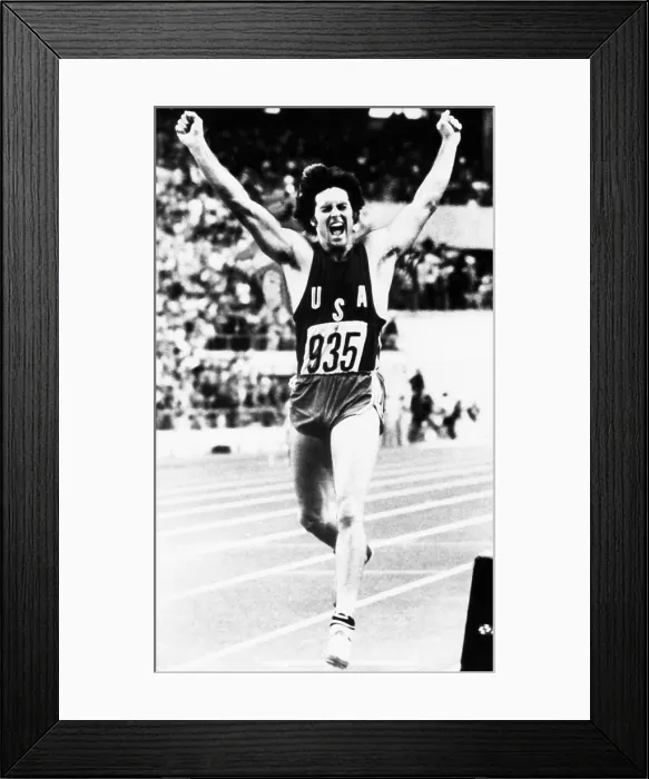 Framed Print : Bruce Jenner just after crossing the finish line to win the Decathlon. He won with a World Record of 8618 points in the 1976 Summer Olympic Games in Montreal. July 1, 1976