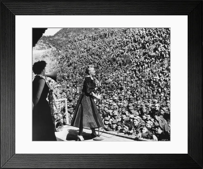 Framed Print : Movie star Betty Hutton entertaining Marines in Korea, March 9, 1952. First Division Marines fill the Montezuma Bowl only a few miles from the fighting front. (CSU_2015_7_355) Framed Print : Movie star Betty Hutton entertaining Marines in Korea, March 9, 1952. First Division Marines fill the Montezuma Bowl only a few miles from the fighting front. (CSU_2015_7_355)