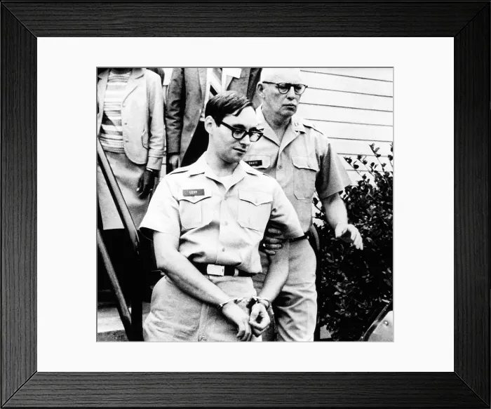 Framed Print : Anti-war Army Capt. Howard Brett Levy handcuffed after receiving a 3 year sentence. June 3, 1967. Dr Framed Print : Anti-war Army Capt. Howard Brett Levy handcuffed after receiving a 3 year sentence. June 3, 1967. Dr