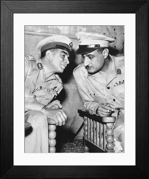 Framed Print : Egypt's strongman premier Muhammad Naguib (left) talking with Lieut. Col. Gamal Abdel Nasser