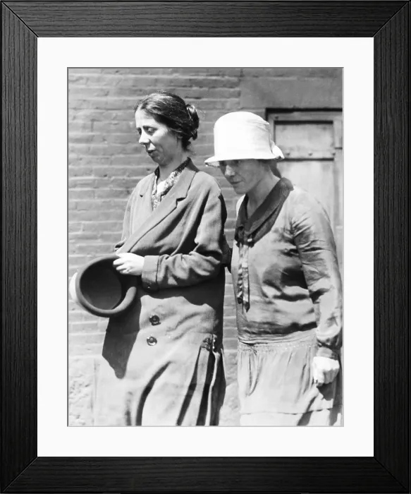 Framed Print : Miss Luigia Vanzetti, (left) is shown leaving the Charlestown State prison with Mrs. Nicola Sacco