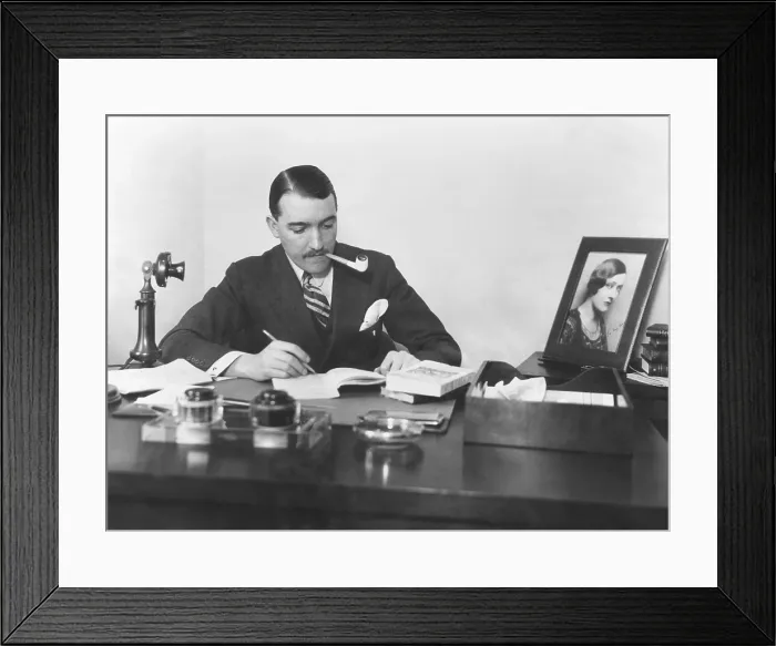 Framed Print : Marquis de la Falaise, 3rd husband of Gloria Swanson, at his small office on 42nd St. NYC. Dec. 1925 Framed Print : Marquis de la Falaise, 3rd husband of Gloria Swanson, at his small office on 42nd St. NYC. Dec. 1925