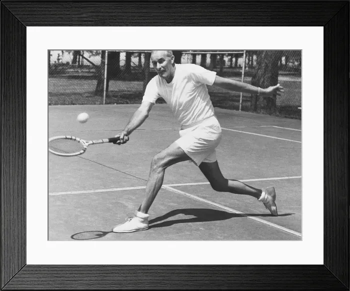 Framed Print : Bill Tilden, former Tennis Champion, at 58 years at Lakewood Park, Ohio. June 1951. He was practicing for the Pro Tennis Tournament, with Mayor A. I. Kauffman. (CSU_2015_11_1333)