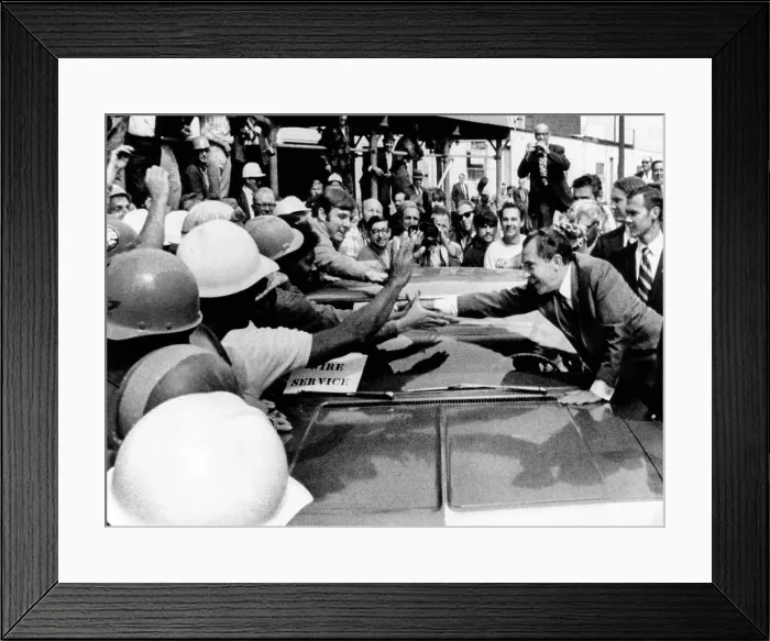 Framed Print : President Richard Nixon leans across car to shake hands with construction workers were from the new IBM building in Chicago. Sept 17, 1970