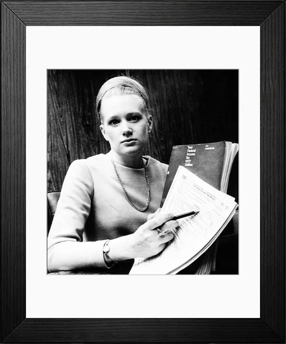 Framed Print : The IRS Marriage Tax in 1971. Catherine McGrath, an attorney with the Security and Exchange Commission accused Congress of discriminatory tax rates. Jan. 22, 1972. Mrs