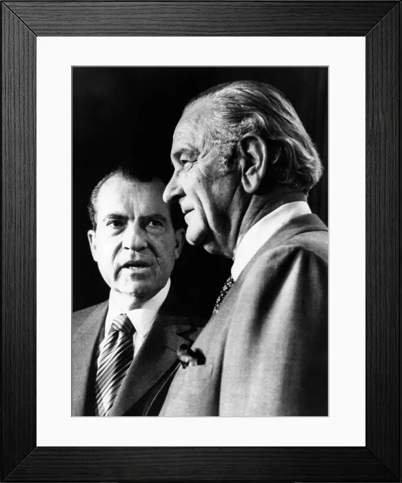Framed Print : President Richard Nixon talks with former Pres. Lyndon Johnson in the new press room in the White House. Nixon invited Johnson for breakfast and a discussion on foreign policy