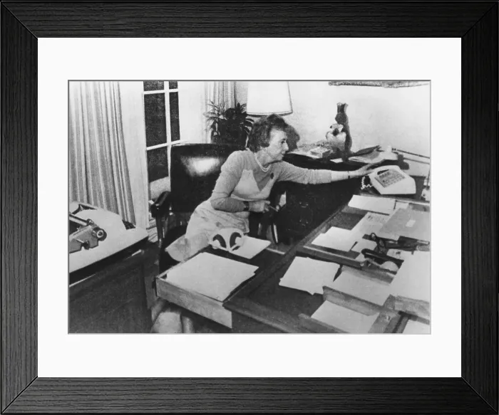 Framed Print : Rosemary Woods, President Nixon's personal secretary, demonstrating the Rose Mary Stretch