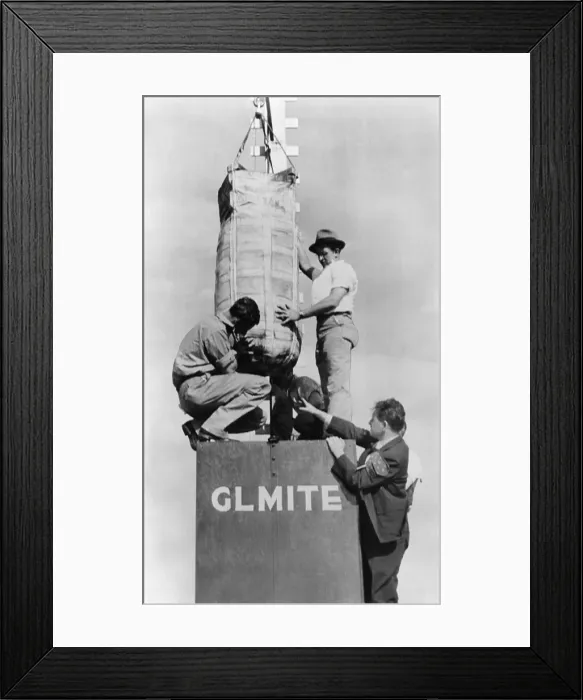 Framed Print : Lester P. Barlow supervising the set up of his GLMITE bomb. He is preparing for a test at Aberdeen Proving Ground, Maryland. (CSU_2015_8_480)