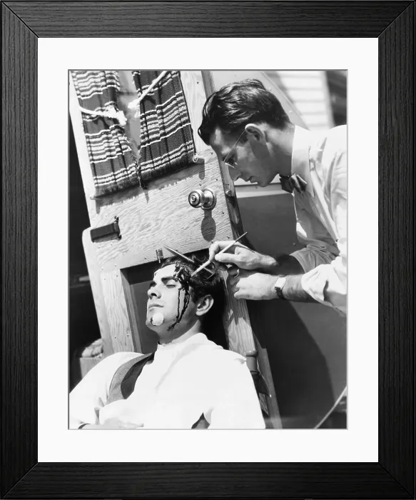 Framed Print : Makeup artist Ben Nye painting blood on actor Tyrone Power, ca. 1940s. He worked on over five hundred Hollywood films from the 1930s to 1960s. (CSU_2015_8_484) Framed Print : Makeup artist Ben Nye painting blood on actor Tyrone Power, ca. 1940s. He worked on over five hundred Hollywood films from the 1930s to 1960s. (CSU_2015_8_484)
