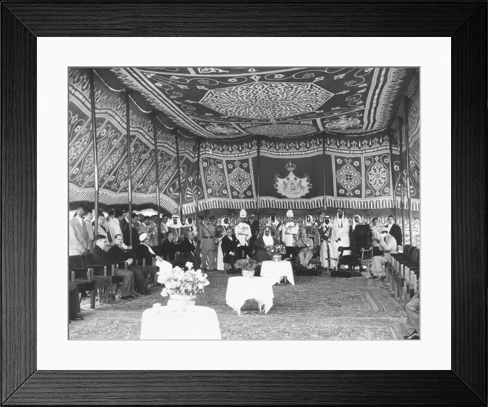 Framed Print : Inside a richly tapestried tent, Iraq's King Faisal meets with King Saud of Saudi Arabia. May 14, 1957 Framed Print : Inside a richly tapestried tent, Iraq's King Faisal meets with King Saud of Saudi Arabia. May 14, 1957