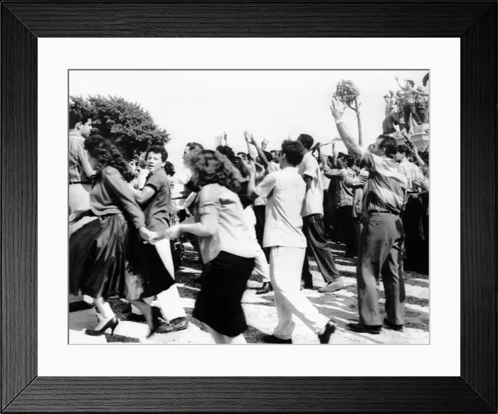 Framed Print : Cubans celebrate the end of President Fulgencio Batista's regime. The dictator fled to the Dominican Republic with 180 supporters more than $300 million. Jan 1, 1959 Framed Print : Cubans celebrate the end of President Fulgencio Batista's regime. The dictator fled to the Dominican Republic with 180 supporters more than $300 million. Jan 1, 1959
