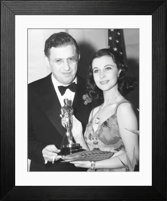 Framed Print : David O. Selznick presented Vivian Leigh with her Oscar for GONE WITH THE WIND. Feb. 29, 1940 Framed Print : David O. Selznick presented Vivian Leigh with her Oscar for GONE WITH THE WIND. Feb. 29, 1940