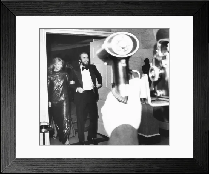 Framed Print : David Hume Kennerly and Candice Bergen arrive for state dinner for Pakistani PM Zuleikar Ali Bhutto. Feb. 5, 1975. Kennerly was President Gerald Ford's personal photographer