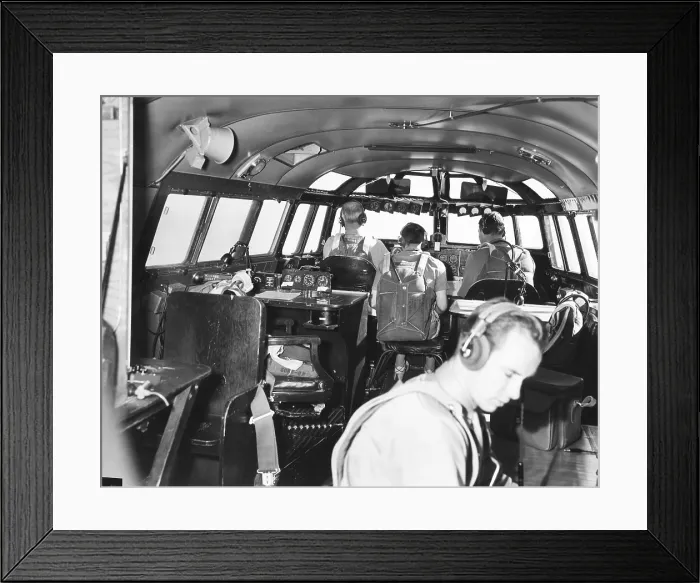 Framed Print : The bridge deck or cabin of the 82-ton Douglas B-19, the world's largest bomber. Nov. 13, 1941. With backs to camera are the pilot, flight engineer, and co-pilot