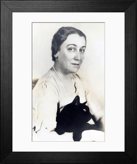 Framed Print : Sophie Kerr, famous writer with her pet alley cat Thomas Hardy'. Ca. 1936