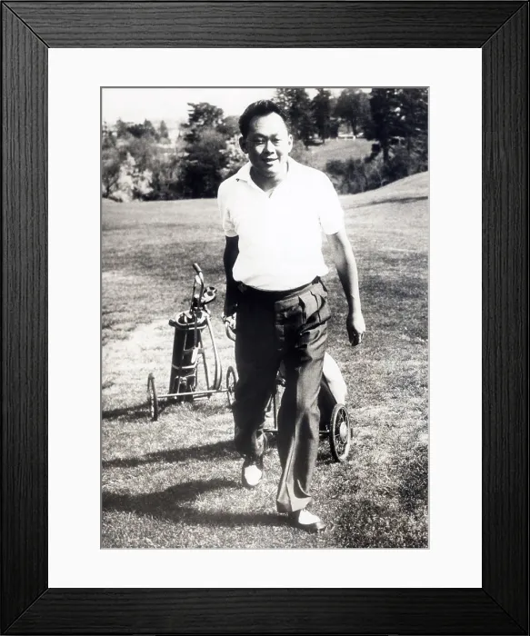 Framed Print : Lee Kwang Yew, Prime Minister of Singapore, golfing while on vacation in Switzerland. May 1962