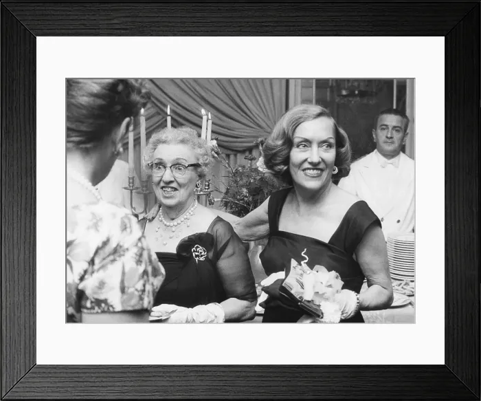 Framed Print : Actress Gloria Swanson (right) and her mother, Mrs. Charles Woodruff, holidaying in Rome. Sept. 27, 1961. Swanson tossed the party in honor of her mother at a Via Veneto Hotel Framed Print : Actress Gloria Swanson (right) and her mother, Mrs. Charles Woodruff, holidaying in Rome. Sept. 27, 1961. Swanson tossed the party in honor of her mother at a Via Veneto Hotel