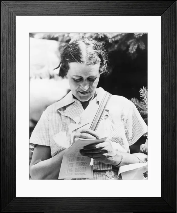 Framed Print : Golfer Opal Hill checking her score of 75 that gave her the medal in the opening round Framed Print : Golfer Opal Hill checking her score of 75 that gave her the medal in the opening round