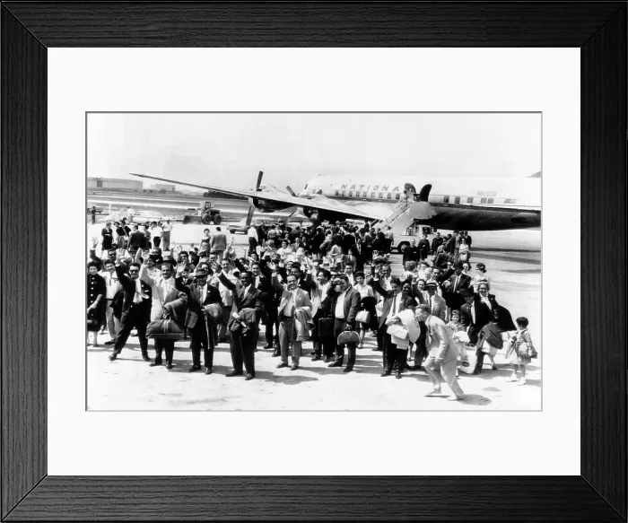 Framed Print : Cuban refugee families arrive at Chicago's O'Hare field from Miami Framed Print : Cuban refugee families arrive at Chicago's O'Hare field from Miami