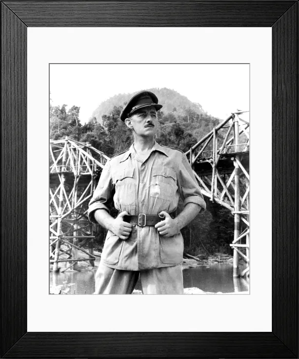 Framed Print : THE BRIDGE ON THE RIVER KWAI, Alec Guinness, 1957 Framed Print : THE BRIDGE ON THE RIVER KWAI, Alec Guinness, 1957