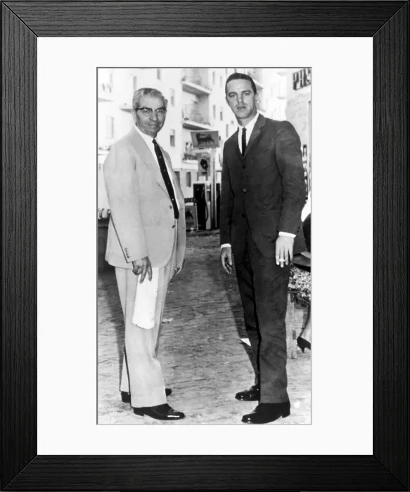 Framed Print : Charlie Lucky Luciano with author Sal Vizzini on via Michelangelo da Caravaggio in Naples, outside Luciano's Royal Art Studio run by his friend Framed Print : Charlie Lucky Luciano with author Sal Vizzini on via Michelangelo da Caravaggio in Naples, outside Luciano's Royal Art Studio run by his friend