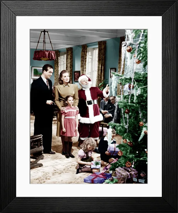 Framed Print : MIRACLE ON 34TH STREET, from left: John Payne, Maureen O'Hara, Natalie Wood, Edmund Gwenn, 1947. 20th Century-Fox Film Corporation, TM & Copyright / courtesy Everett Collection Framed Print : MIRACLE ON 34TH STREET, from left: John Payne, Maureen O'Hara, Natalie Wood, Edmund Gwenn, 1947. 20th Century-Fox Film Corporation, TM & Copyright / courtesy Everett Collection