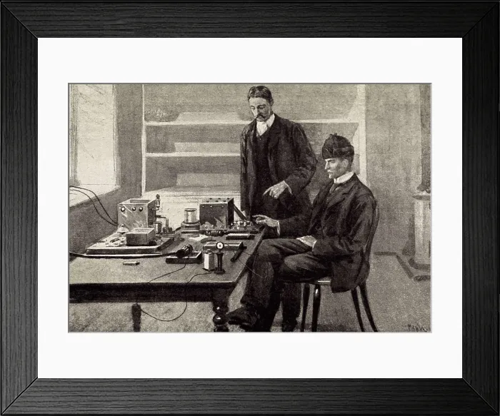 Framed Print : Marconi receiving the first transatlantic wireless transmission in a radio station located in Newfoundland. Engraving. AISA / Everett Collection**US SALES ONLY** Framed Print : Marconi receiving the first transatlantic wireless transmission in a radio station located in Newfoundland. Engraving. AISA / Everett Collection**US SALES ONLY**