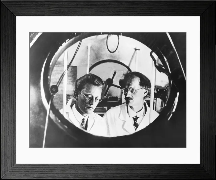 Framed Print : Auguste Piccard and his assistant Charles Kipfer preparing for ascent to the atmosphere. On Sept. 20, 1930