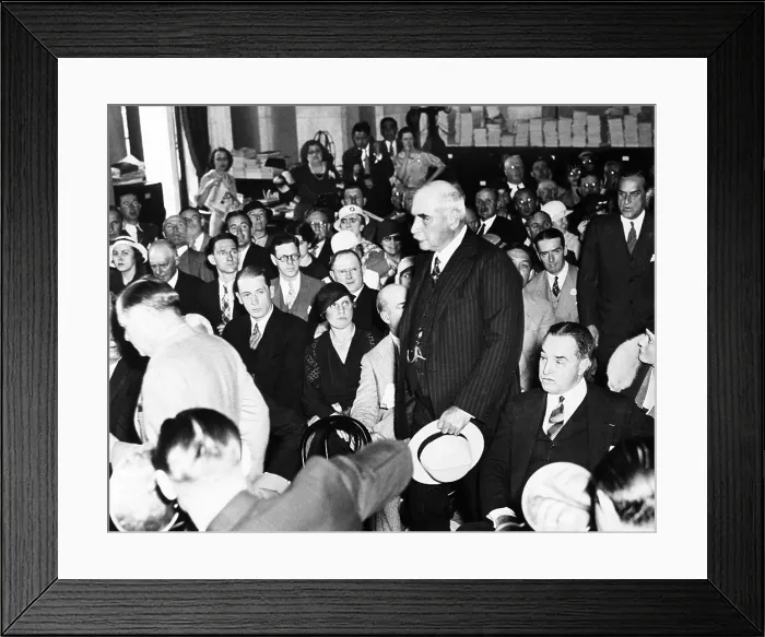 Framed Print : J.P. Morgan Jr. arriving to testify to the Senate Banking and Currency Committee. May 23, 1933. Witnesses and Senators are seated in the Caucus Room of the Senate Office Building