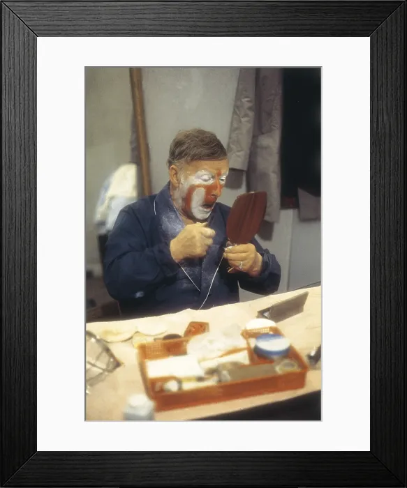 Framed Print : RIVEL, Josep Andreu, called Charlie (1896-1983). Spanish clown. Charlie Rivel making up in his dressing room before a performance (1983). SPAIN. MADRID (AUTONOMOUS COMMUNITY)