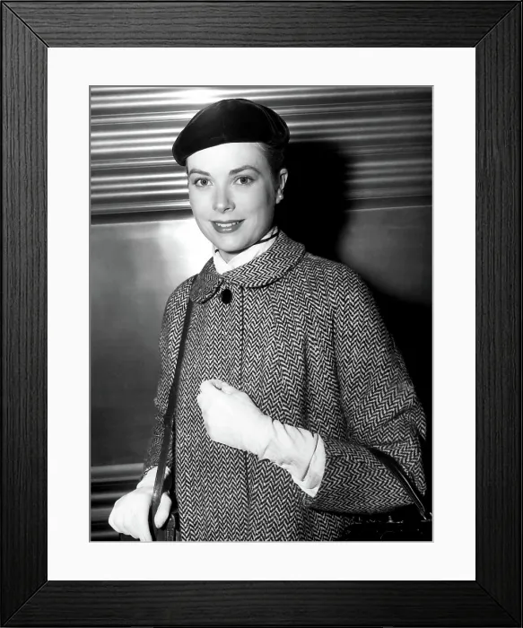 Framed Print : GRACE KELLY, in beret, arrives at Penn Station after location shooting for THE SWAN, 1955