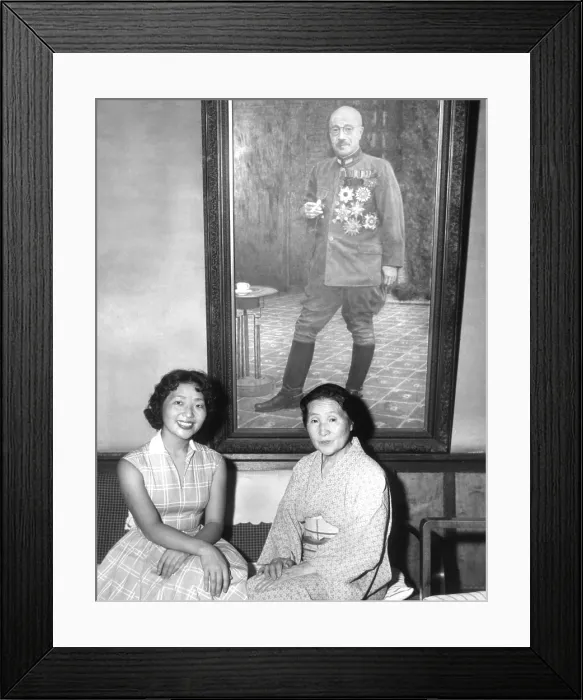Framed Print : Kimiye Tojo, 26, with her mother, Katseko, before a painting of Japanese Premier Hideki Tojo Framed Print : Kimiye Tojo, 26, with her mother, Katseko, before a painting of Japanese Premier Hideki Tojo