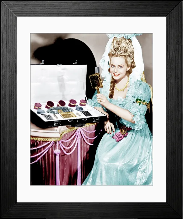 Framed Print : KITTY, Paulette Goddard poses with the $25, 000 toiletry set she uses in the film, 1945 Framed Print : KITTY, Paulette Goddard poses with the $25, 000 toiletry set she uses in the film, 1945