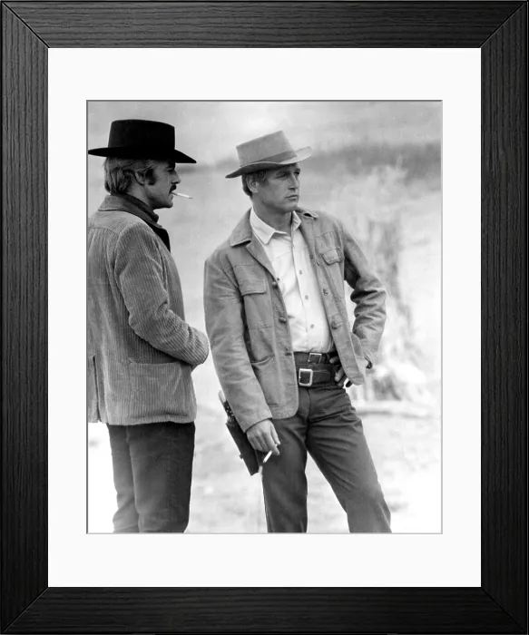 Framed Print : Robert Redford, Paul Newman smoking cigarettes between takes on BUTCH CASSIDY AND THE SUNDANCE KID, 1969. TM and Copyright (c) 20th Century Fox Film Corp. All rights reserved Framed Print : Robert Redford, Paul Newman smoking cigarettes between takes on BUTCH CASSIDY AND THE SUNDANCE KID, 1969. TM and Copyright (c) 20th Century Fox Film Corp. All rights reserved