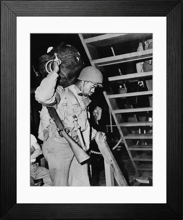 Framed Print : World War II, African American soldier carrying sack and rifle, circa 1940-1946 Framed Print : World War II, African American soldier carrying sack and rifle, circa 1940-1946