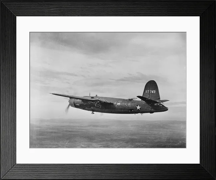 Framed Print : World War II, B-26 Martin Marauder, riddled with bullets in the engine and left wing making a successful trip back after a bombing raid in Tunisia, circa 1943