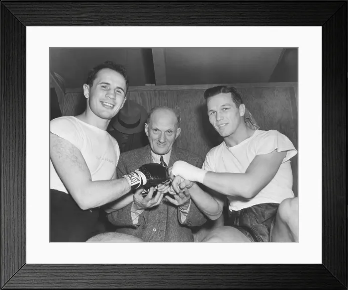 Framed Print : Boxing promoter Mike Jacobs between middleweight boxers, Tony Zale and Georgie Abrams. They were promoting a reprise of their Nov