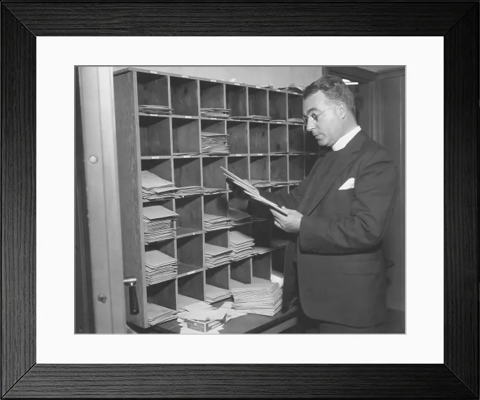 Framed Print : Charles Coughlin looking at his mail in 1934. At his top popularity in the early 1930s, he received 80, 000 letter a week Framed Print : Charles Coughlin looking at his mail in 1934. At his top popularity in the early 1930s, he received 80, 000 letter a week