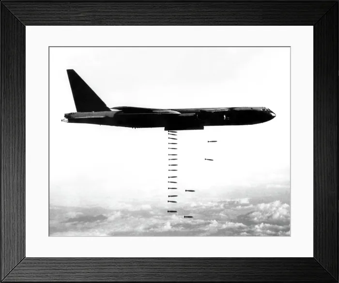 Framed Print : Vietnam War, B-52 Stratofortress (from the Third Air Division's 4133rd Bombardment Wing) releasing a bomb train over targets in Vietnam, 03 / 31 / 67